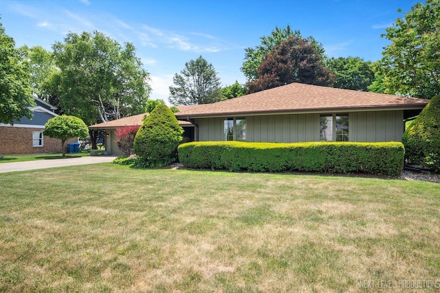 2050 Alschuler Dr, Aurora, IL 60506 - ranch-style home with a front lawn, driveway, and an attached garage