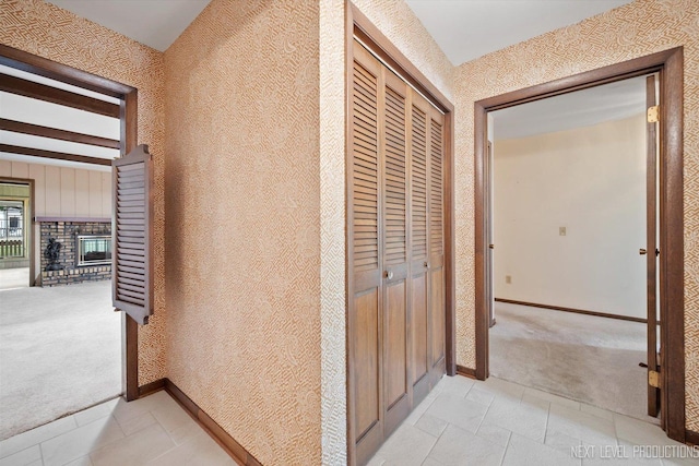 2050 Alschuler Dr, Aurora, IL 60506 - corridor with light colored carpet and light tile patterned floors