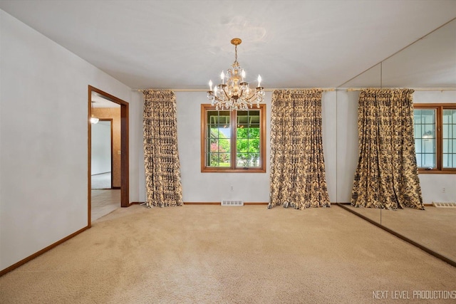 2050 Alschuler Dr, Aurora, IL 60506 - carpeted spare room with a chandelier and baseboards