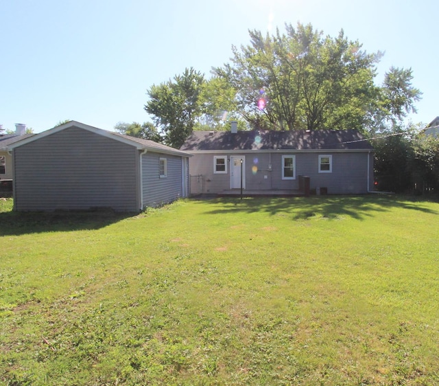 1521 Adams St, Lake In The Hills, IL 60156 - back of house featuring a yard