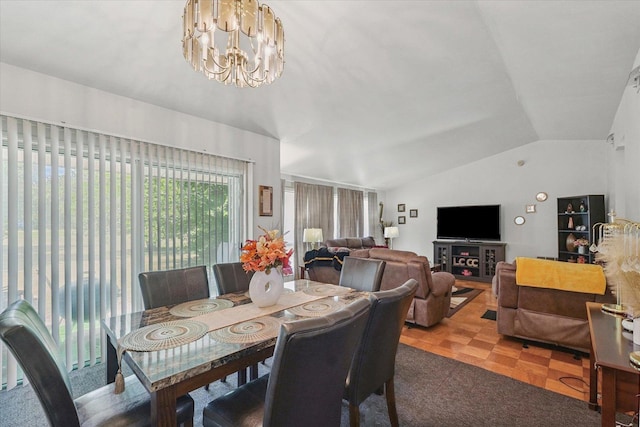 1565 S Pointe Dr, Rantoul, IL 61866 - dining room with vaulted ceiling and a chandelier