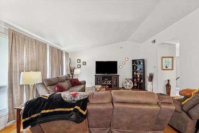 1565 S Pointe Dr, Rantoul, IL 61866 - living area with lofted ceiling, healthy amount of natural light, and light wood-style floors