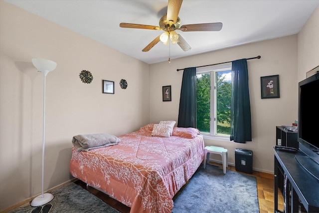 1565 S Pointe Dr, Rantoul, IL 61866 - bedroom with a ceiling fan and baseboards