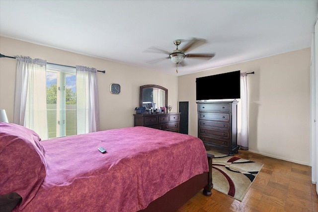 1565 S Pointe Dr, Rantoul, IL 61866 - bedroom featuring ceiling fan and baseboards