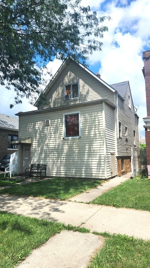 5234 W 25th Pl, Cicero, IL 60804 - view of side of home with a lawn