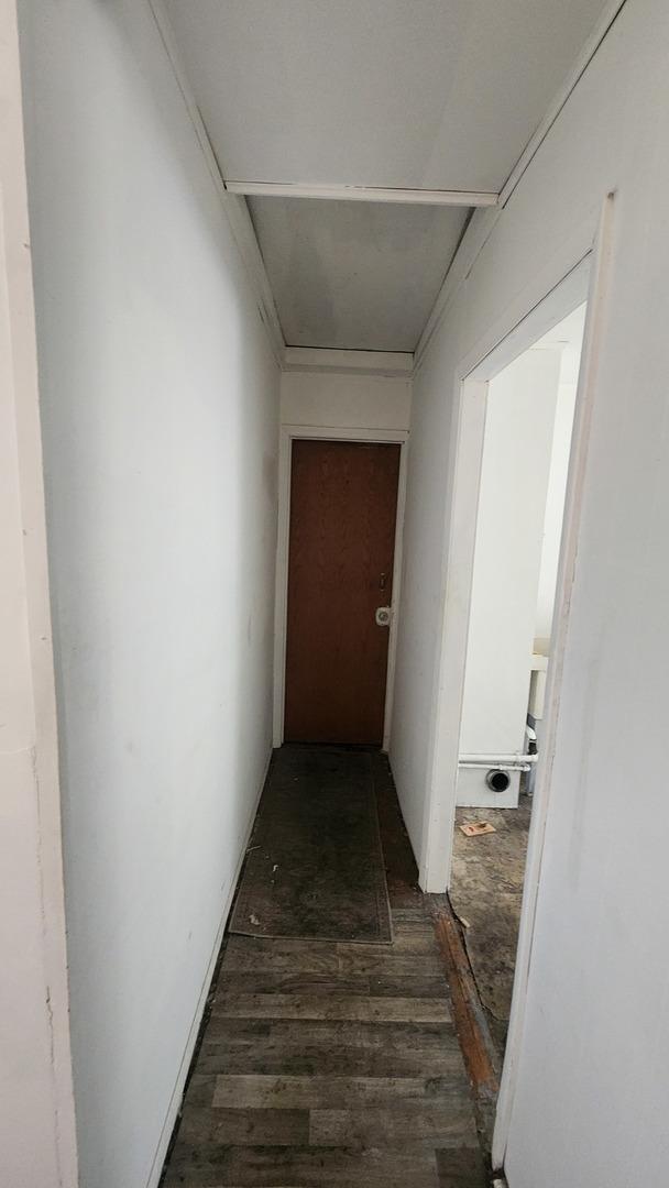 5234 W 25th Pl, Cicero, IL 60804 - hallway with dark wood finished floors