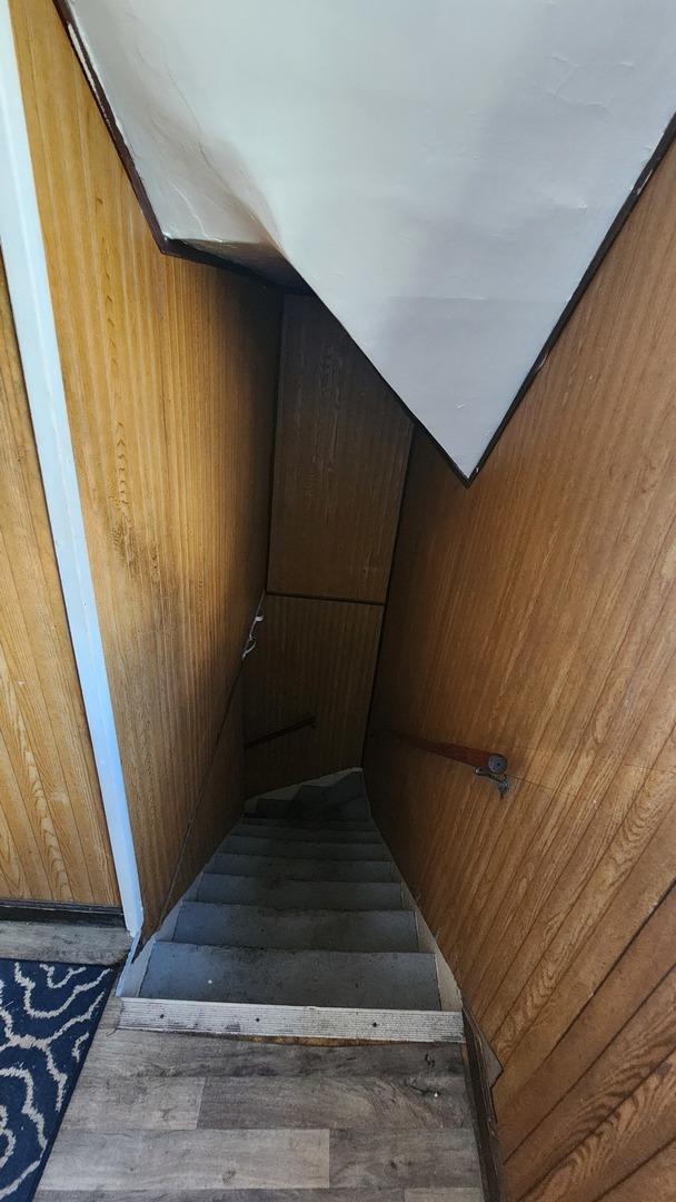 5234 W 25th Pl, Cicero, IL 60804 - staircase featuring wood finished floors
