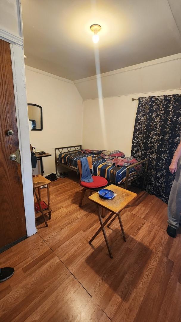 5234 W 25th Pl, Cicero, IL 60804 - bedroom featuring wood finished floors and vaulted ceiling