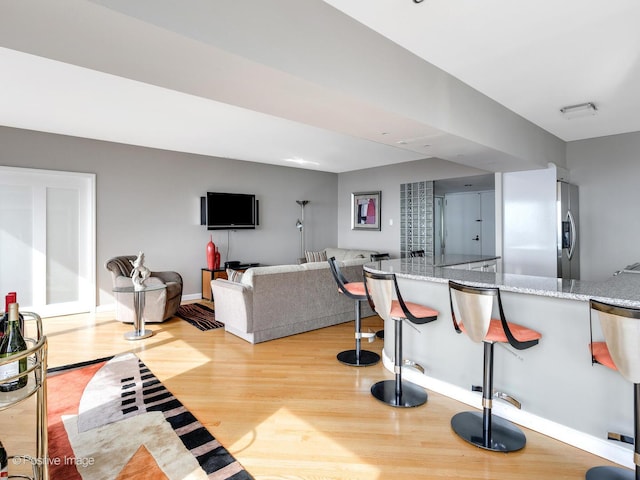 175 E Delaware Pl Unit 8808, Chicago, IL 60611 - living room featuring light wood finished floors