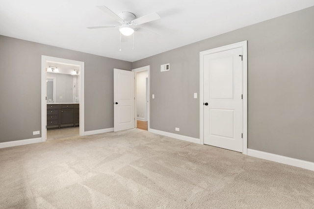 22W672 Elmwood Dr, Glen Ellyn, IL 60137 - unfurnished bedroom with light colored carpet, ensuite bath, and a ceiling fan