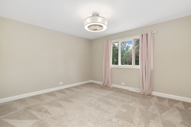 22W672 Elmwood Dr, Glen Ellyn, IL 60137 - spare room featuring light colored carpet