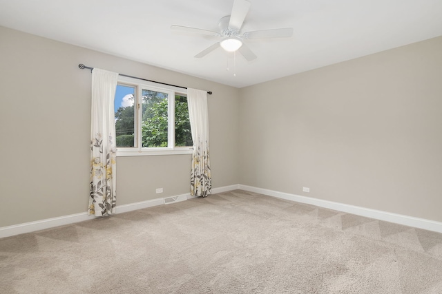 22W672 Elmwood Dr, Glen Ellyn, IL 60137 - carpeted empty room featuring a ceiling fan and baseboards
