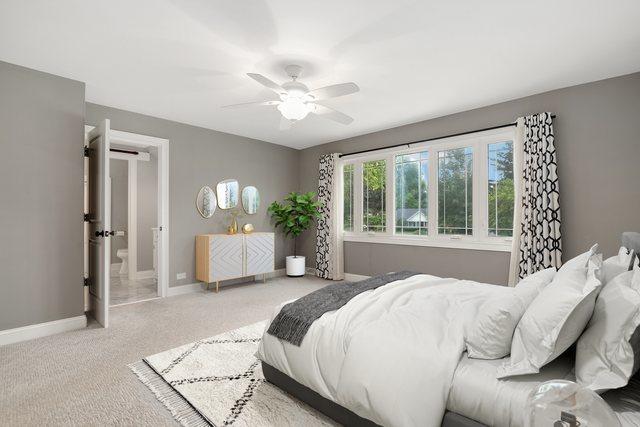 22W672 Elmwood Dr, Glen Ellyn, IL 60137 - carpeted bedroom with baseboards and ceiling fan