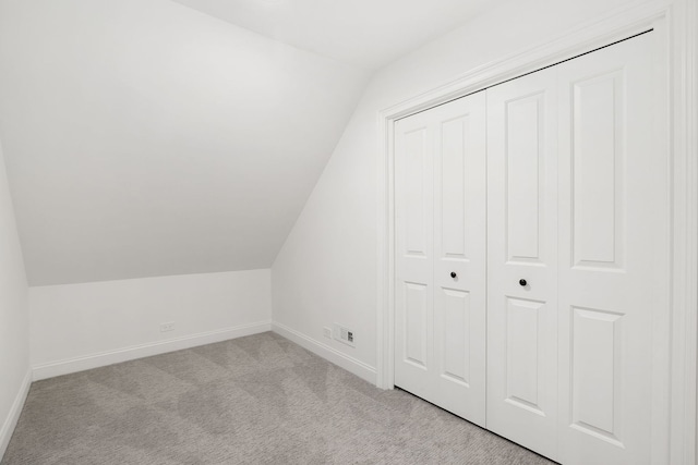 22W672 Elmwood Dr, Glen Ellyn, IL 60137 - additional living space with vaulted ceiling and carpet flooring