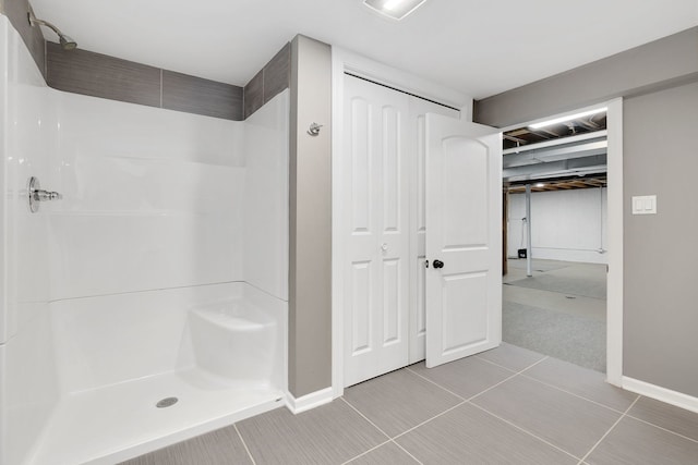 22W672 Elmwood Dr, Glen Ellyn, IL 60137 - full bathroom featuring a closet, a shower, and tile patterned floors