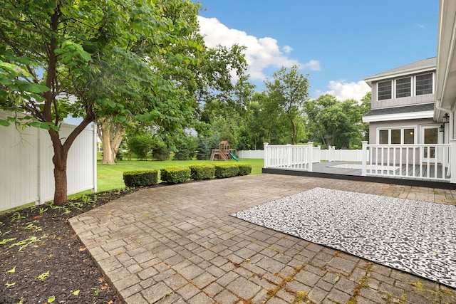 22W672 Elmwood Dr, Glen Ellyn, IL 60137 - view of patio / terrace with a playground and a deck
