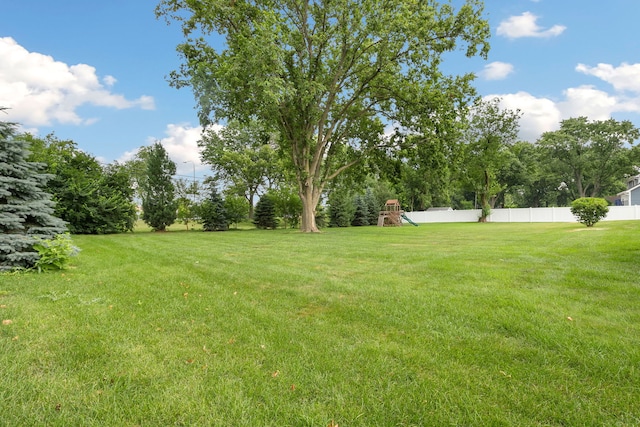 22W672 Elmwood Dr, Glen Ellyn, IL 60137 - view of yard with a playground and view of scattered trees