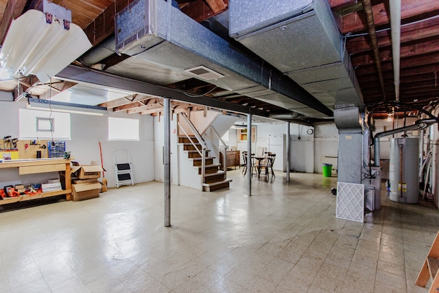 3628 N Oconto Ave, Chicago, IL 60634 - basement with water heater, stairs, tile patterned floors, and heating unit