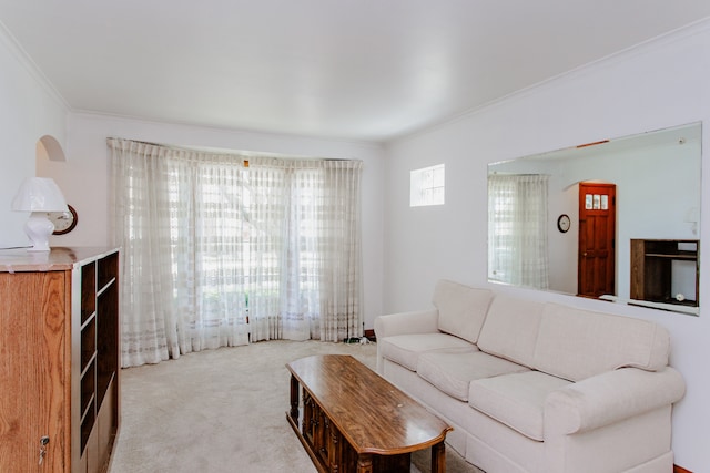 3628 N Oconto Ave, Chicago, IL 60634 - living room featuring ornamental molding, light carpet, and arched walkways