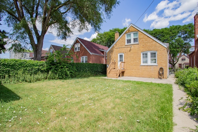 3628 N Oconto Ave, Chicago, IL 60634 - back of property with a chimney and brick siding