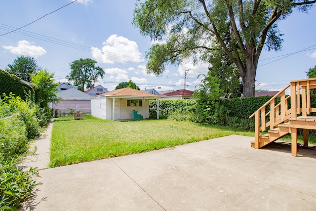 3628 N Oconto Ave, Chicago, IL 60634 - view of yard featuring a patio and an outbuilding