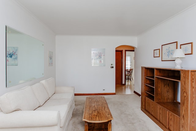 3628 N Oconto Ave, Chicago, IL 60634 - living room featuring arched walkways, ornamental molding, and light colored carpet