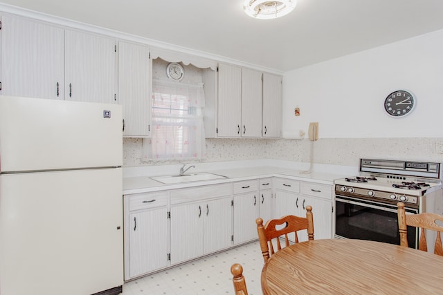 3628 N Oconto Ave, Chicago, IL 60634 - kitchen with white appliances, light countertops, and light flooring