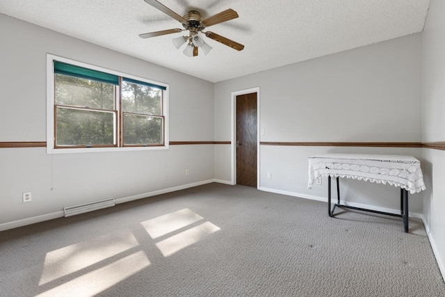 11280 James Ct, Genoa, IL 60135 - carpeted spare room with a ceiling fan and a textured ceiling
