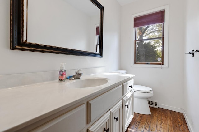 11280 James Ct, Genoa, IL 60135 - half bathroom with vanity and wood finished floors