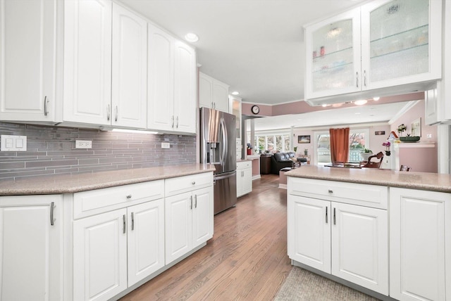 905 W Palm Dr, Mount Prospect, IL 60056 - kitchen with stainless steel refrigerator with ice dispenser, white cabinetry, light wood finished floors, recessed lighting, and crown molding