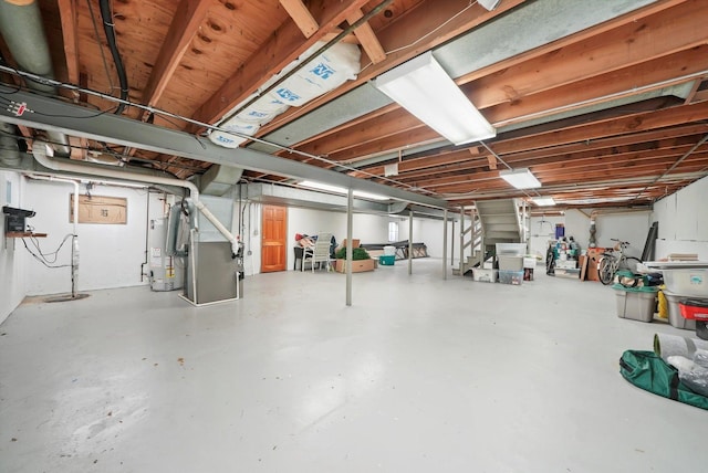 905 W Palm Dr, Mount Prospect, IL 60056 - unfinished below grade area with stairway, water heater, and heating unit