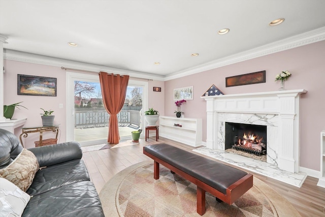 905 W Palm Dr, Mount Prospect, IL 60056 - living room with light wood-style floors, recessed lighting, ornamental molding, and a high end fireplace