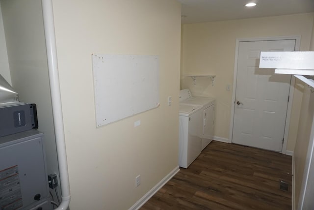 washroom with wood finished floors, independent washer and dryer, and recessed lighting