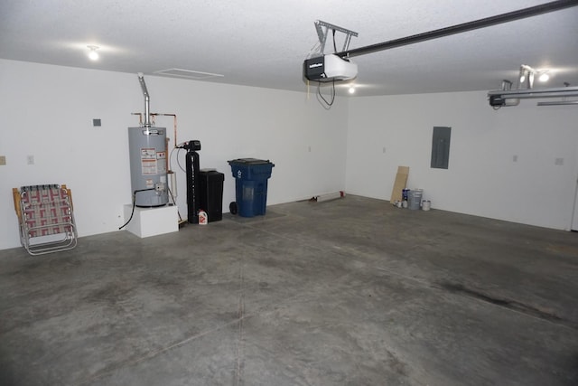garage featuring gas water heater, a garage door opener, and electric panel