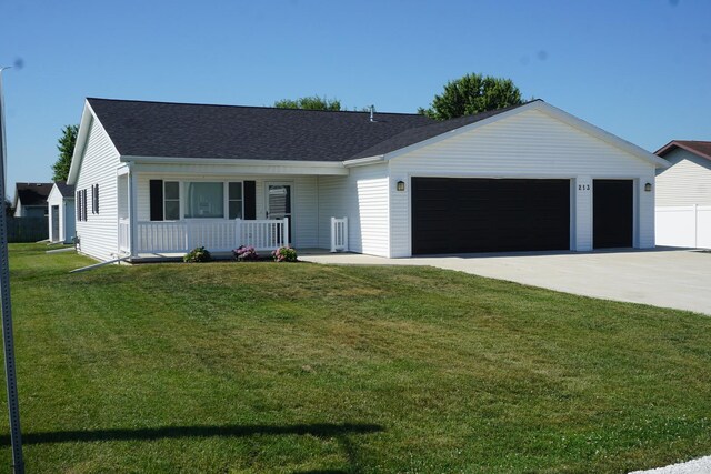ranch-style home featuring a porch, a garage, a front yard, driveway, and roof with shingles