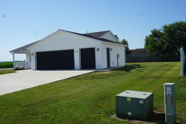 view of side of home with a garage