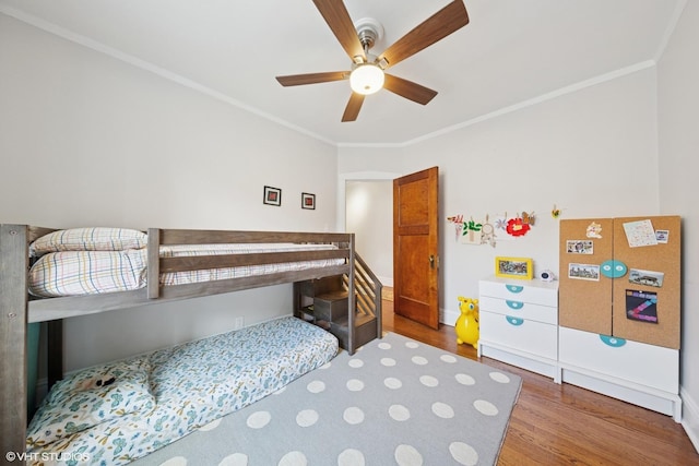 5308 N Glenwood Ave Unit 3N, Chicago, IL 60640 - bedroom with wood finished floors, ornamental molding, and a ceiling fan