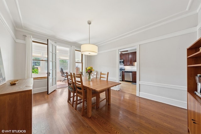 5308 N Glenwood Ave Unit 3N, Chicago, IL 60640 - dining space featuring wood finished floors and crown molding