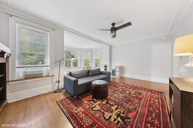 5308 N Glenwood Ave Unit 3N, Chicago, IL 60640 - living area featuring wood finished floors, a ceiling fan, cooling unit, and ornamental molding