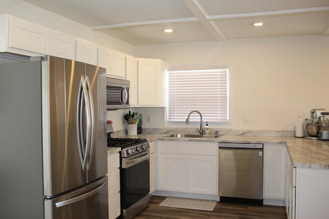 631 Central Ave, Joliet, IL 60436 - kitchen featuring appliances with stainless steel finishes, light countertops, white cabinetry, dark wood-style flooring, and recessed lighting