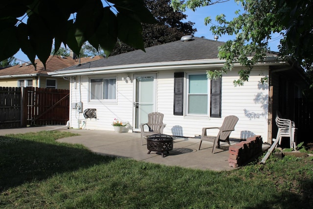 631 Central Ave, Joliet, IL 60436 - back of house with a patio, a fire pit, roof with shingles, and a gate