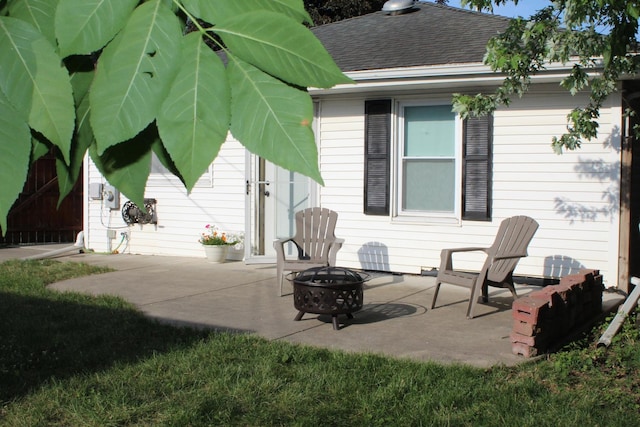 631 Central Ave, Joliet, IL 60436 - view of patio featuring an outdoor fire pit