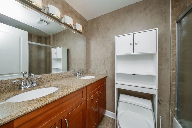 1S215 Stratford Ln, Villa Park, IL 60181 - full bathroom with double vanity and tile patterned flooring