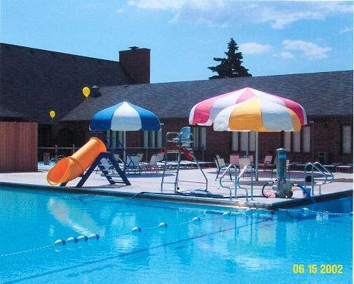1S215 Stratford Ln, Villa Park, IL 60181 - community pool featuring a patio