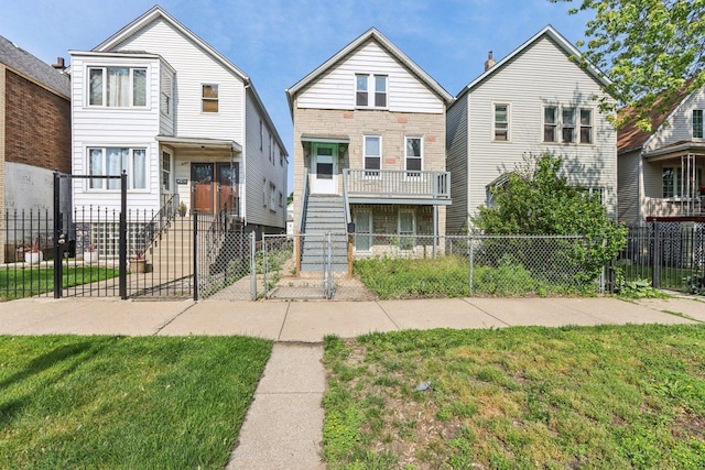 9720 S Exchange Ave, Chicago, IL 60617 - view of front of house with a fenced front yard and stairs