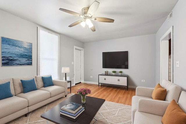 9720 S Exchange Ave, Chicago, IL 60617 - living room with a ceiling fan and wood finished floors