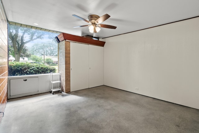 330 S Rosedale Ave, Aurora, IL 60506 - empty room with ceiling fan and concrete flooring