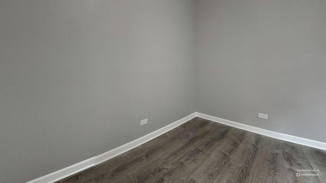 5738 S Carpenter St, Chicago, IL 60621 - unfurnished room featuring dark wood finished floors and baseboards