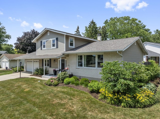 1426 E Kenilworth Ave, Palatine, IL 60074 - view of front of home featuring concrete driveway, a front lawn, a shingled roof, a chimney, and brick siding