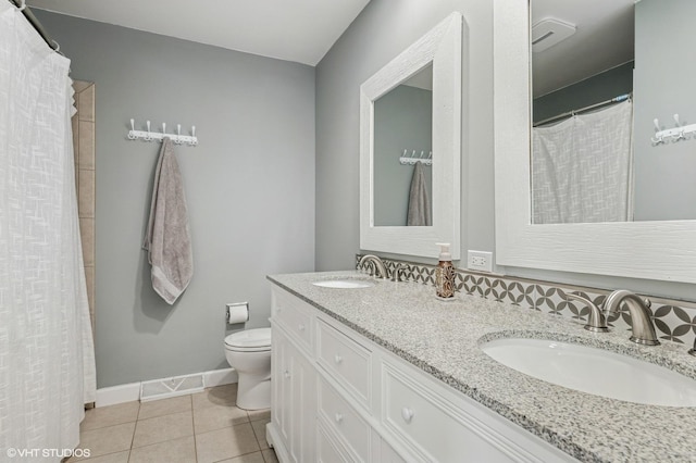 1426 E Kenilworth Ave, Palatine, IL 60074 - bathroom featuring double vanity and tile patterned flooring